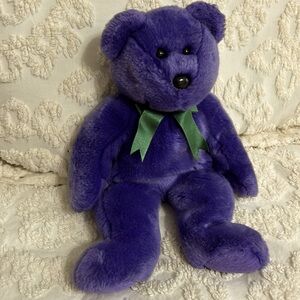 TY Beanie Babies 2000 Purple 12” Stuff Animal with green bow.